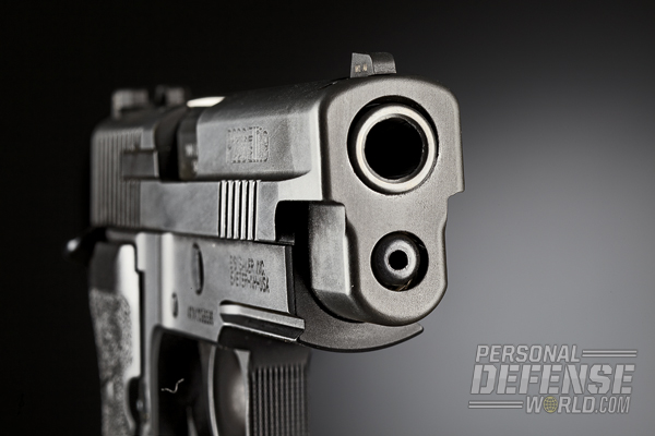 The business end of the P226 Elite’s 4.4-inch match-grade barrel. Note the forward slide serrations.