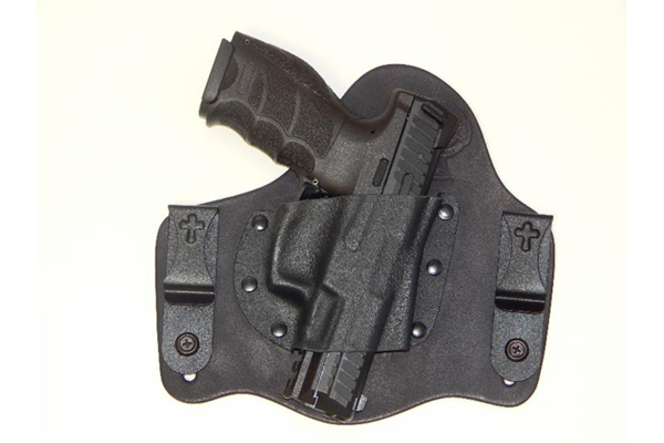 The Heckler & Koch VP9 is shown below holstered in a SuperTuck by CrossBreed.