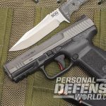 Canik TP9SF Elite pistol with knife