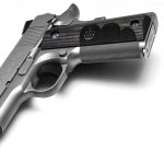 Colt Wiley Clapp Stainless Commander 1911 pistol angle