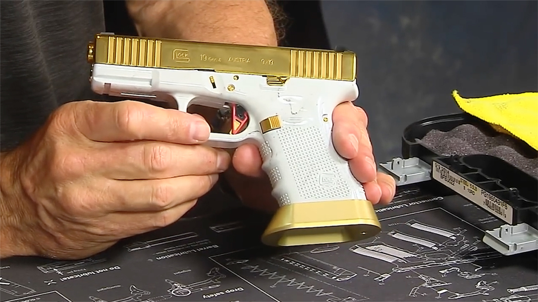 Lenny Magill takes you through a custom Glock 19 Gen4 with a polished gold ...