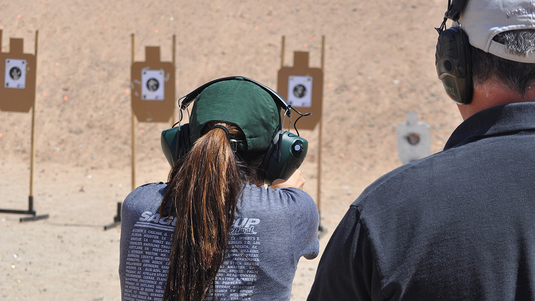 new female shooters shooting target