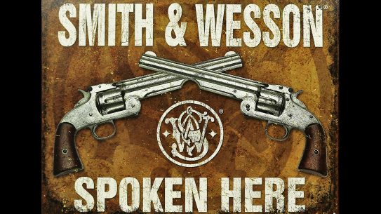 Smith & Wesson Spoken Here sign, suspect shot