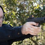 Walther PPQ Q4 TAC Pistol author shooting
