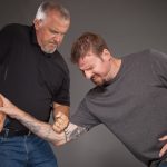 Learn how to protect your firearms when an adversary tries to snatch it.