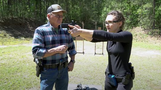 Jerry and Lena Miculek discuss switching from irons to optics.