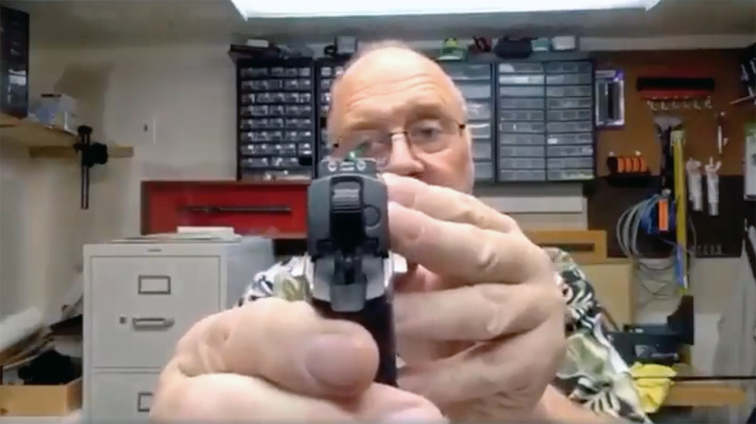 A man proceeds to break every single gun safety rule during a video.
