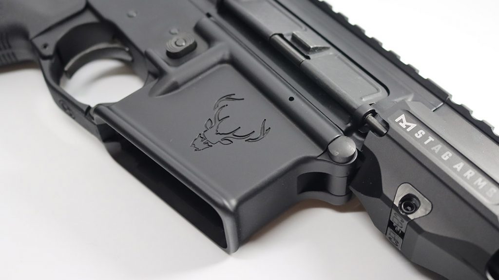 The mag well of the Stag Arms 15 Tactical has the edgier Stag logo embossed in the side.