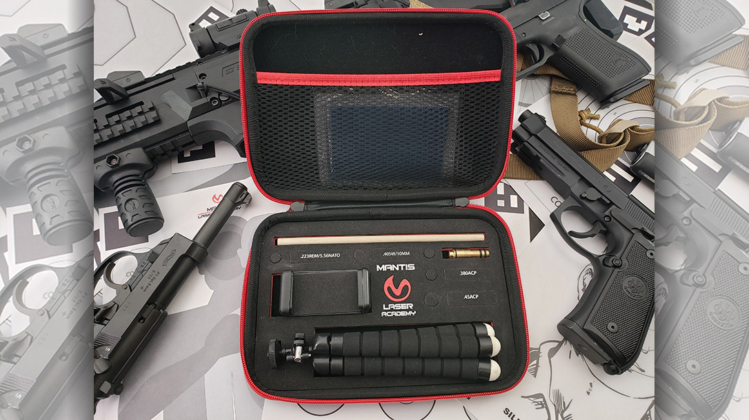 The basic dry fire training kit comes in a padded case with the small tripod, phone mount, extraction stick, and laser in the caliber of your choice.