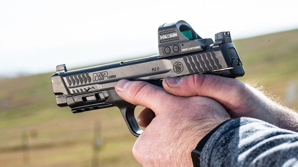 The Holosun RD looks right at home atop the Smith & Wesson M&P 10mm M2.0. The tall iron sights can be used with the red-dot mounted.
