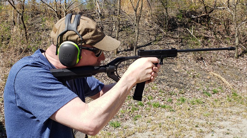 The author shooting the Endo Tactical with a 16-inch barrel.